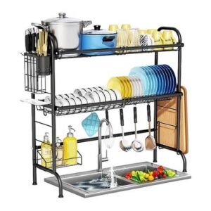 A kitchen sink with a tall two tier rack that has dishes stacked to show how it works.